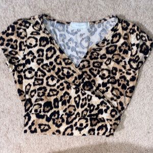 leopard cross front tie back shirt